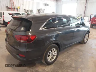 2019 Kia Sorento LX with VIN 5XYPGDA55KG556605, listed as a IAAI auction lot 42451151 with 83,171 mi miles and . Bid and sale history available at DreamBid. Image 4.