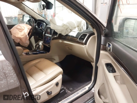 2018 Jeep Grand Cherokee Limited with VIN 1C4RJFBG2JC139502, listed as a IAAI auction lot 41372877 with 145,877 mi miles and . Bid and sale history available at DreamBid. Image 5.