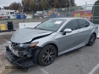 2023 Toyota Camry SE with VIN 4T1G11AKXPU809876, listed as a IAAI auction lot 42100546 with 35,055 mi miles and . Bid and sale history available at DreamBid. Image 2.
