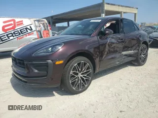 2024 Porsche Macan with VIN WP1AA2A53RLB14849, listed as a Copart auction lot 57979155 with 10,031 mi miles and Salvage title. Bid and sale history available at DreamBid. Image 1.