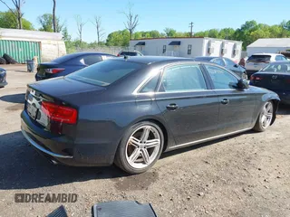 2013 Audi A8 3.0L with VIN WAURGAFD0DN005532, listed as a IAAI auction lot 42113540 with 176,635 mi miles and . Bid and sale history available at DreamBid. Image 4.