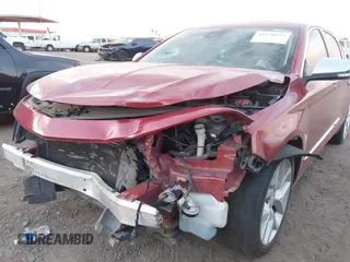 2014 Chevrolet Impala LTZ z VIN 1G1155S32EU141591, wystawiony jako IAAI lot #42150675 z przebiegiem Nie podano mil oraz . Historia ofert i sprzedaży dostępna na DreamBid. Obrazek 6.