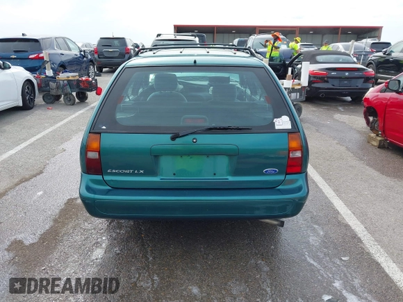 1997 Ford Escort LX with VIN 3FALP15P1VR169817, listed as a IAAI auction lot 42094673 with 111,762 mi miles. Bid and sale history available at carsss.com. Image 16.