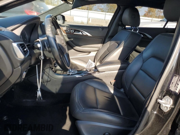 2018 Infiniti QX30 Luxury with VIN SJKCH5CR4JA056321, listed as a Copart auction lot 76099664 with 56,537 mi miles and Salvage Title. Bid and sale history available at DreamBid. Image 7.