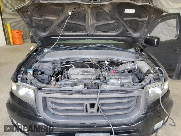2013 Honda Ridgeline RTL with VIN 5FPYK1F57DB008861, listed as a Copart auction lot 55998335 with 226,567 mi miles and Salvage title. Bid and sale history available at DreamBid. Image 11.