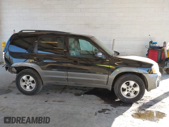2002 Mazda Tribute LX with VIN 4F2CU08172KM58561, listed as a IAAI auction lot 41435407 with 141,908 mi miles and . Bid and sale history available at carsss.com. Image 13.