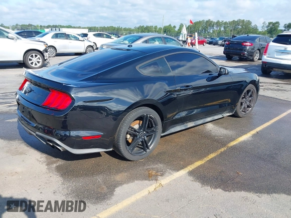 2019 Ford Mustang EcoBoost with VIN 1FA6P8THXK5124729, listed as a IAAI auction lot 42384176 with 134,028 mi miles and . Bid and sale history available at DreamBid. Image 4.