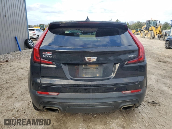 2020 Cadillac XT4 FWD Luxury with VIN 1GYAZAR47LF142704, listed as a Copart auction lot 86730714 with 122,356 mi miles and Salvage Title. Bid and sale history available at DreamBid. Image 6.