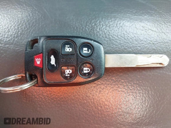 2012 Honda Odyssey EX-L z VIN 5FNRL5H61CB032353, wystawiony jako IAAI lot #42471691 z przebiegiem 186 257 mil mil oraz . Historia ofert i sprzedaży dostępna na DreamBid. Obrazek 11.