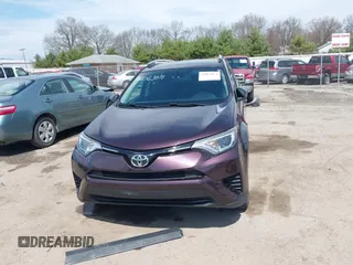 2016 Toyota RAV4 LE with VIN 2T3ZFREV8GW310580, listed as a IAAI auction lot 42063071 with 104,099 mi miles and . Bid and sale history available at DreamBid. Image 13.