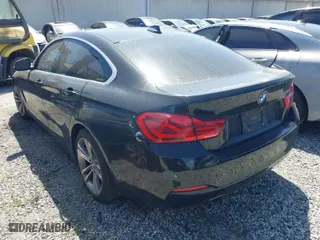 2019 BMW 4 Series 430i with VIN WBA4J1C59KBM16385, listed as a IAAI auction lot 41708630 with 97,993 mi miles. Bid and sale history available at carsss.com. Image 3.