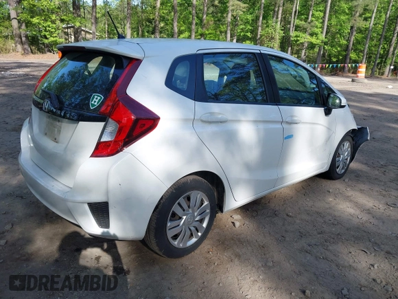 2015 Honda Fit LX with VIN 3HGGK5H50FM772396, listed as a IAAI auction lot 42112723 with 125,419 mi miles and . Bid and sale history available at DreamBid. Image 4.