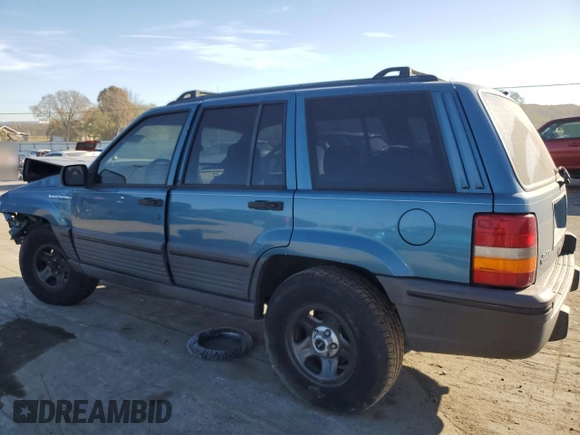 1994 Jeep Grand Cherokee Laredo with VIN 1J4FX58S1RC334178, listed as a Copart auction lot 75943554 with 165,435 mi miles and Clean Title. Bid and sale history available at carsss.com. Image 2.