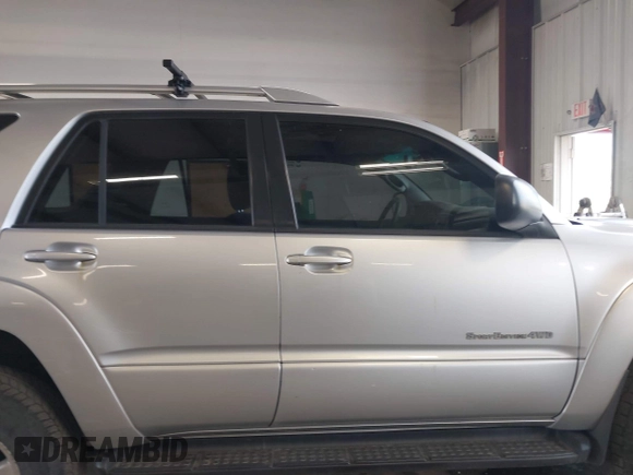 2005 Toyota 4Runner SR5 with VIN JTEBT14R858025666, listed as a IAAI auction lot 42022937 with 302,497 mi miles and . Bid and sale history available at DreamBid. Image 14.