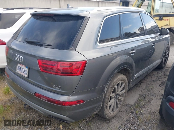 2017 Audi Q7 Premium with VIN WA1AAAF71HD010675, listed as a IAAI auction lot 41956959 with 136,549 mi miles and . Bid and sale history available at DreamBid. Image 4.