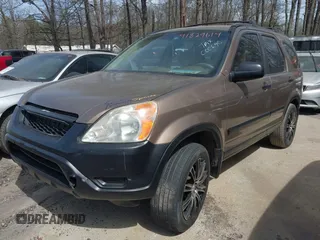 2002 Honda CR-V LX with VIN JHLRD68422C000690, listed as a IAAI auction lot 41829614 with 295,589 mi miles and . Bid and sale history available at carsss.com. Image 2.