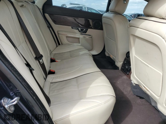 2015 Jaguar XJ Portfolio with VIN SAJWA2GZ9F8V79511, listed as a Copart auction lot 78453394 with 53,341 mi miles and Salvage title. Bid and sale history available at DreamBid. Image 10.