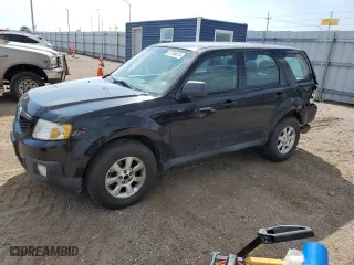 2010 Mazda Tribute Touring with VIN 4F2CY9C75AKM02945, listed as a Copart auction lot 67784674 with 134,363 mi miles and Salvage Title. Bid and sale history available at carsss.com. Image 1.
