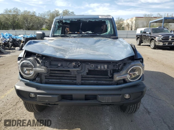 2023 Ford Bronco z VIN 1FMDE5AH6PLB63177, wystawiony jako Copart lot #52208625 z przebiegiem 10 865 mil mil oraz Szkoda całkowita • Salvage title. Historia ofert i sprzedaży dostępna na DreamBid. Obrazek 5.