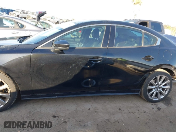 2020 Mazda 3 Premium with VIN 3MZBPAEM2LM124405, listed as a IAAI auction lot 41478818 with 72,551 mi miles and . Bid and sale history available at DreamBid. Image 15.