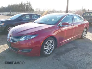 2014 Lincoln MKZ z VIN 3LN6L2GK6ER828030, wystawiony jako IAAI lot #41732835 z przebiegiem 172 978 mil mil oraz . Historia ofert i sprzedaży dostępna na DreamBid. Obrazek 2.