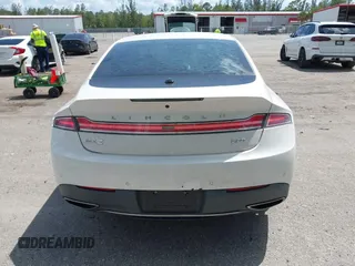 2017 Lincoln MKZ Select z VIN 3LN6L5C98HR607862, wystawiony jako IAAI lot #42072856 z przebiegiem 37 357 mil mil oraz . Historia ofert i sprzedaży dostępna na DreamBid. Obrazek 16.