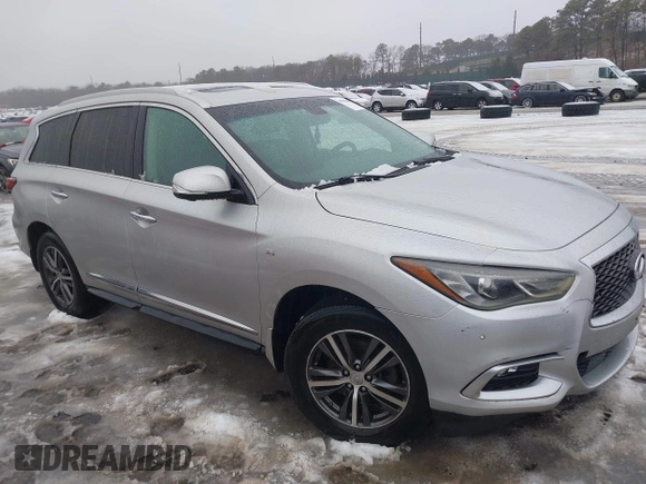 2016 Infiniti QX60 with VIN 5N1AL0MMXGC505959, listed as a IAAI auction lot 41513268 with 130,142 mi miles and . Bid and sale history available at DreamBid. Image 13.