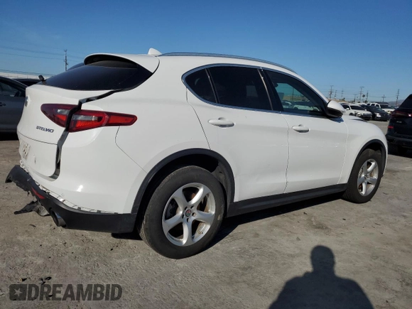 2019 Alfa Romeo Stelvio z VIN ZASPAJAN3K7C72152, wystawiony jako Copart lot #49764735 z przebiegiem 53 857 mil mil oraz Szkody całkowita. Historia ofert i sprzedaży dostępna na DreamBid. Obrazek 3.