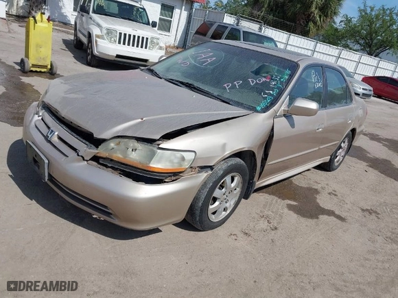 2002 Honda Accord Sdn SE with VIN 1HGCG66812A155003, listed as a IAAI auction lot 41934724 with 192,129 mi miles. Bid and sale history available at carsss.com. Image 2.