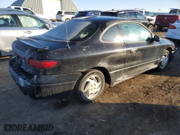 2002 Ford Escort ZX2 Standard z VIN 3FAFP11332R100994, wystawiony jako Copart lot #88085795 z przebiegiem 83 162 mil mil oraz Szkoda całkowita • Salvage title. Historia ofert i sprzedaży dostępna na DreamBid. Obrazek 3.