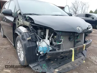 2011 Toyota Sienna XLE AAS with VIN 5TDYK3DC9BS071636, listed as a IAAI auction lot 41972332 with 204,477 mi miles and . Bid and sale history available at DreamBid. Image 6.