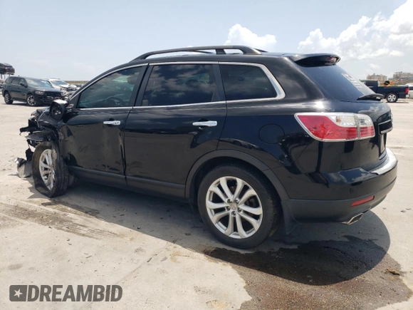 2012 Mazda CX-9 Grand Touring with VIN JM3TB2DA4C0361023, listed as a Copart auction lot 63839005 with 140,784 mi miles and Salvage title. Bid and sale history available at DreamBid. Image 2.