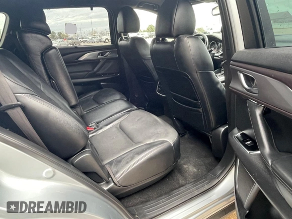 2017 Mazda CX-9 Grand Touring with VIN JM3TCADY7H0136915, listed as a Copart auction lot 57106855 with 135,872 mi miles and Clean title. Bid and sale history available at DreamBid. Image 6.
