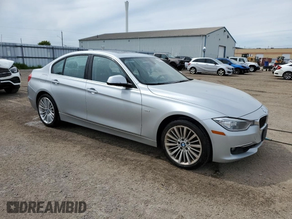 2013 BMW 3 Series 328i xDrive with VIN WBA3B3C5XDF531142, listed as a Copart auction lot 58651745 with 209,990 mi miles and Clean title. Bid and sale history available at DreamBid. Image 4.