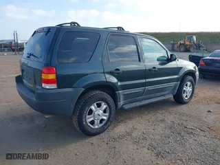 2003 Ford Escape XLT Popular 2 with VIN 1FMYU93113KE18944, listed as a IAAI auction lot 42056372 with 244,942 mi miles. Bid and sale history available at carsss.com. Image 4.