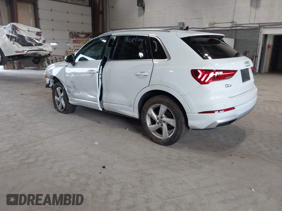 2020 Audi Q3 Premium with VIN WA1AECF3XL1090825, listed as a IAAI auction lot 42541577 with 32,432 mi miles and . Bid and sale history available at DreamBid. Image 3.