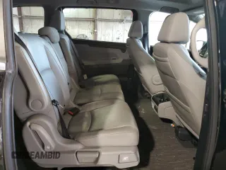 2021 Honda Odyssey Touring with VIN 5FNRL6H84MB009125, listed as a Copart auction lot 58248385 with 55,360 mi miles and Salvage title. Bid and sale history available at DreamBid. Image 11.