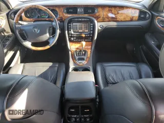 2004 Jaguar XJ VDP with VIN SAJWA74C54SG18384, listed as a Copart auction lot 83081974 with 141,664 mi miles and Salvage Title. Bid and sale history available at carsss.com. Image 8.