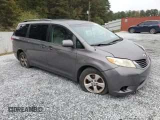 2012 Toyota Sienna with VIN 5TDKA3DC8CS009526, listed as a Copart auction lot 80279714 with 186,703 mi miles and Salvage Title. Bid and sale history available at DreamBid. Image 4.