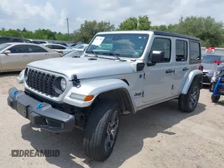 2024 Jeep Wrangler Sport S with VIN 1C4RJXN60RW208013, listed as a IAAI auction lot 42117388 with 34,407 mi miles and . Bid and sale history available at DreamBid. Image 2.
