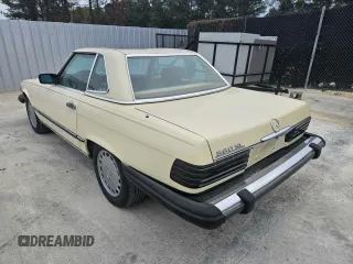 1987 Mercedes-Benz 560 SL with VIN WDBBA48D5HA061899, listed as a Copart auction lot 87742235 with 68,292 mi miles and Salvage Title. Bid and sale history available at DreamBid. Image 3.