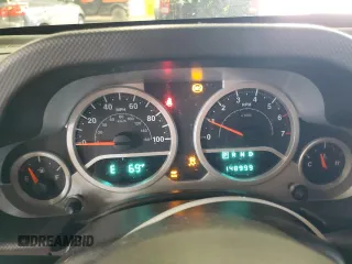 2010 Jeep Wrangler Sport with VIN 1J4AA2D14AL185552, listed as a Copart auction lot 54823975 with 148,999 mi miles and Clean Title. Bid and sale history available at carsss.com. Image 9.