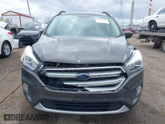2017 Ford Escape SE with VIN 1FMCU9GD4HUE45193, listed as a IAAI auction lot 42055861 with 154,961 mi miles and . Bid and sale history available at DreamBid. Image 6.