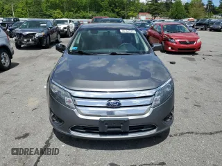 2012 Ford Fusion SE z VIN 3FAHP0HA6CR183815, wystawiony jako Copart lot #58187975 z przebiegiem 118 101 mil mil oraz Szkoda całkowita • Salvage title. Historia ofert i sprzedaży dostępna na DreamBid. Obrazek 5.