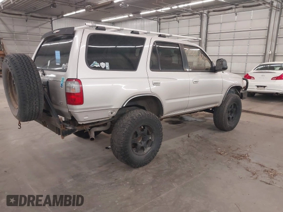 1998 Toyota 4Runner SR5 with VIN JT3HN86R1W0180174, listed as a IAAI auction lot 42065817 with 252,961 mi miles and . Bid and sale history available at DreamBid. Image 4.