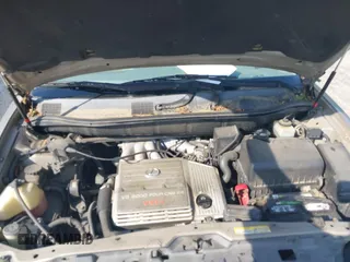 1999 Lexus RX 300 z VIN JT6GF10U8X0015207, wystawiony jako IAAI lot #42133074 z przebiegiem 230 216 mil mil oraz . Historia ofert i sprzedaży dostępna na DreamBid. Obrazek 10.