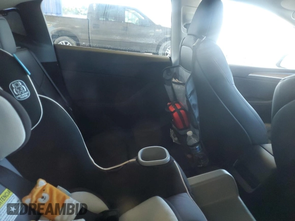 2024 Tesla Model Y с VIN 7SAYGDED5RF086456, выставлен на аукционе Copart как лот 57994835 с пробегом Не указан миль и Списание • Salvage title. История ставок и продаж доступна на DreamBid. Изображение 10.