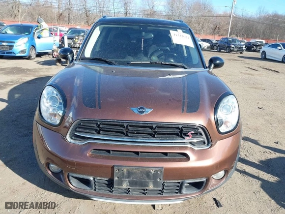 2015 MINI Cooper Countryman S with VIN WMWZC5C55FWP47826, listed as a IAAI auction lot 41342674 with 94,683 mi miles. Bid and sale history available at carsss.com. Image 6.