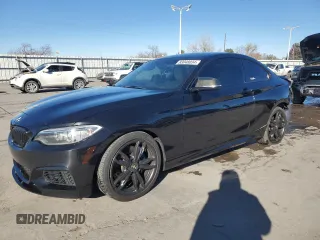 2016 BMW 2 Series M235i xDrive with VIN WBA1J9C54GV696210, listed as a Copart auction lot 83048034 with 94,424 mi miles and Salvage Title. Bid and sale history available at carsss.com. Image 1.