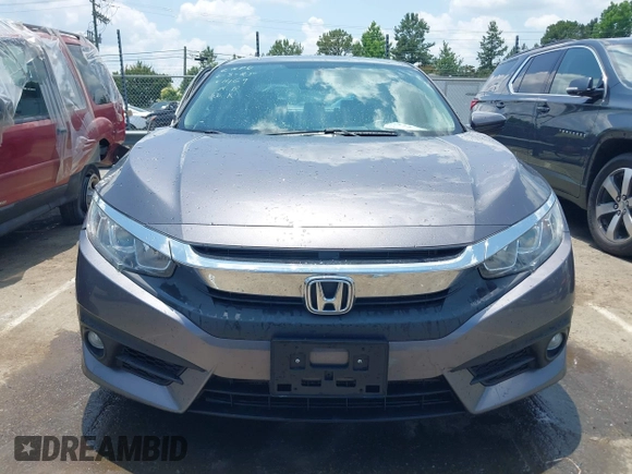 2016 Honda Civic EX-L with VIN 19XFC1F77GE201469, listed as a IAAI auction lot 42441617 with 67,803 mi miles and . Bid and sale history available at DreamBid. Image 12.